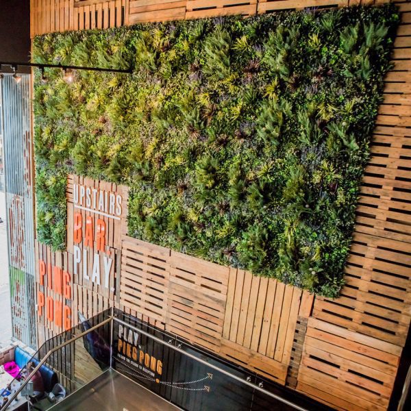 Real-looking living wall panels ion wooden slatts
