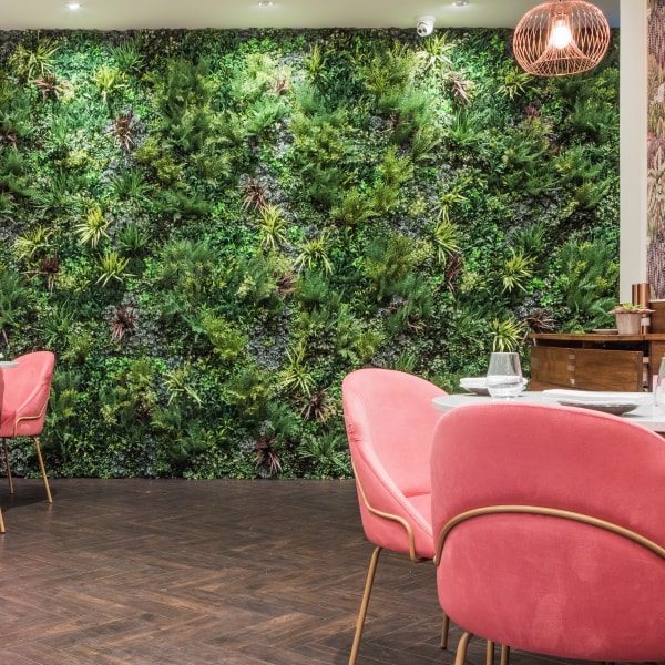 restaurant interior design using artificial green wall feature