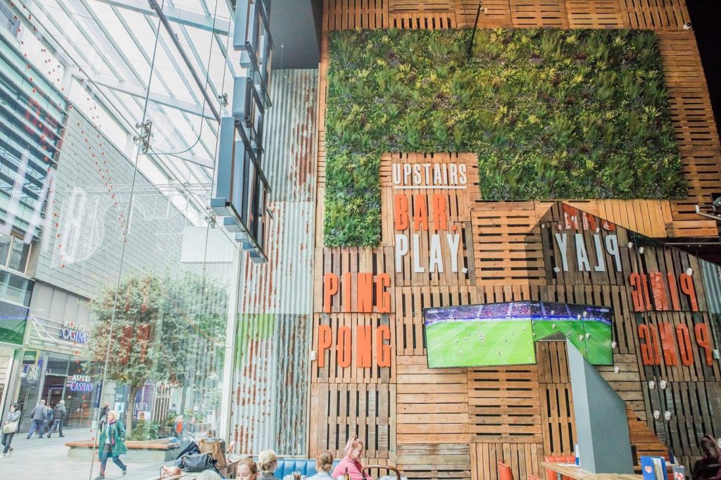 artificial green wall installation at the bat and ball westfield stratford