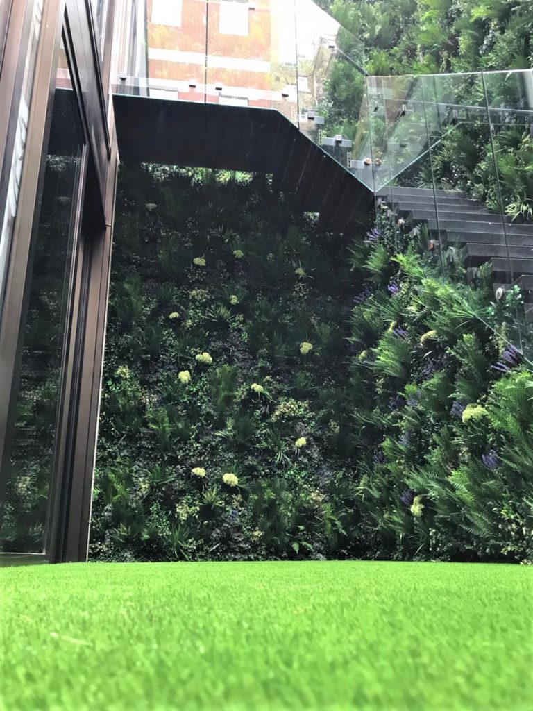 Artificial green wall in London Stairway
