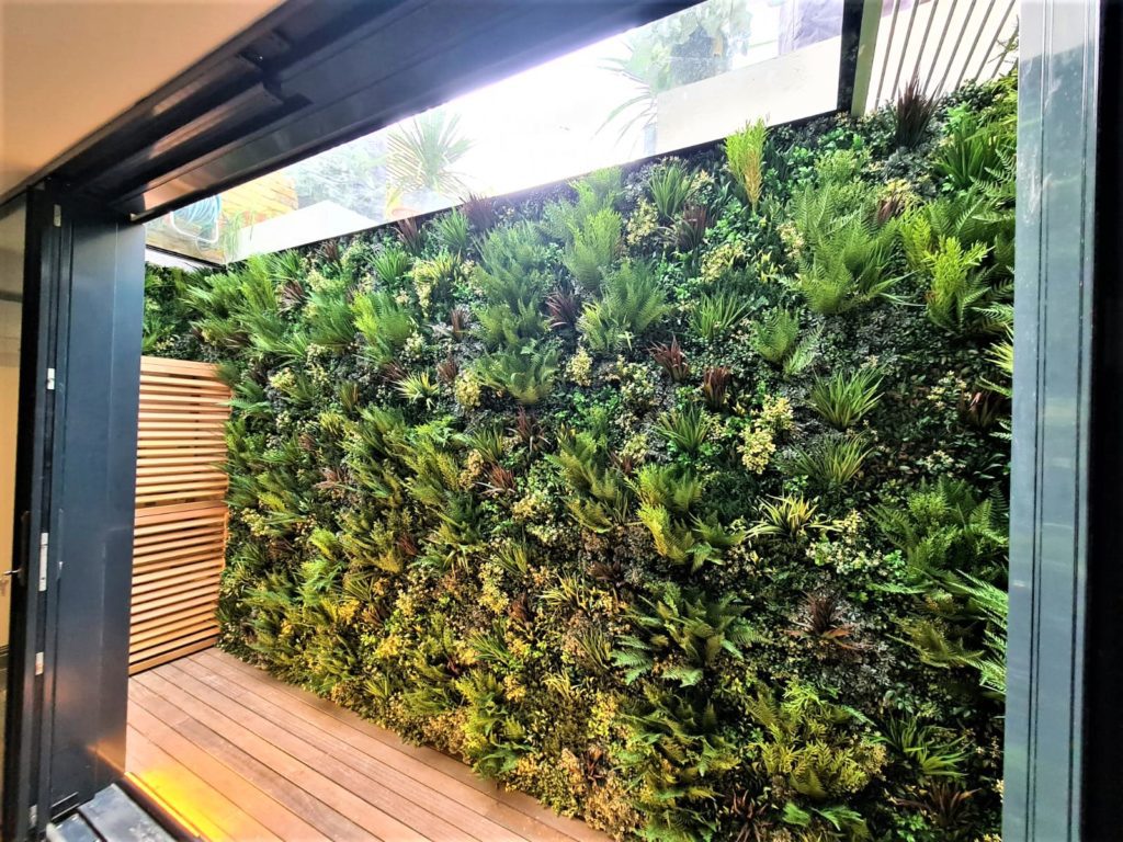 Fake Green wall installation in a London lightwell