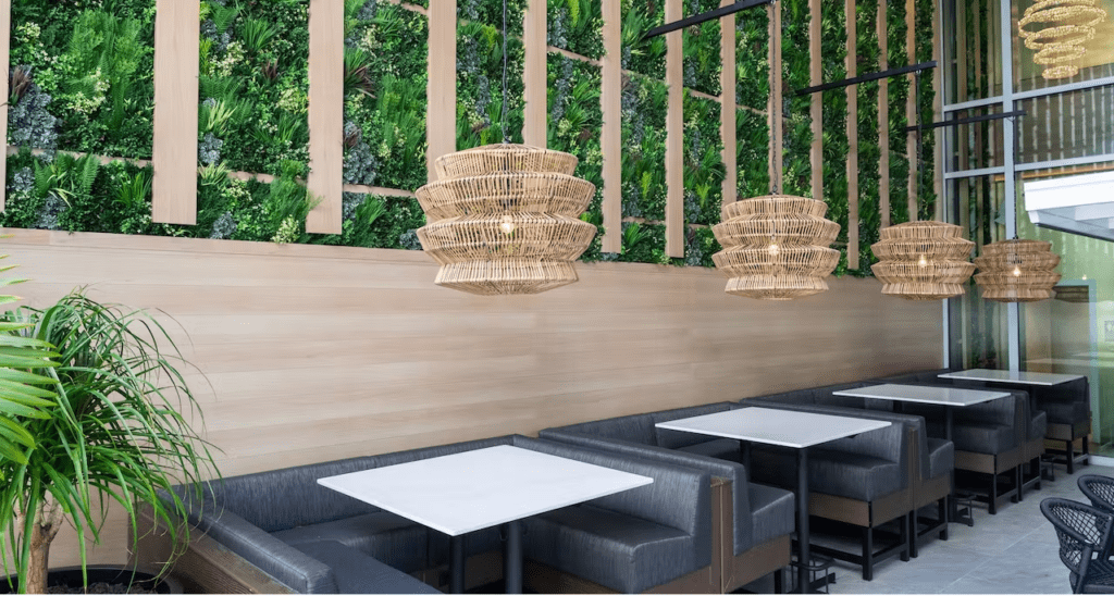 Moxies restaurant in Fort Lauderdale, Florida with a faux green wall